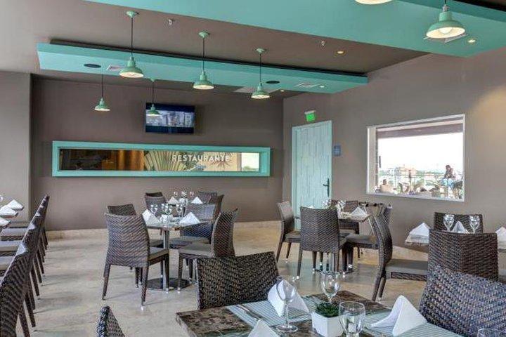 Ghl Hotel Monteria Bagian luar foto The interior of the restaurant