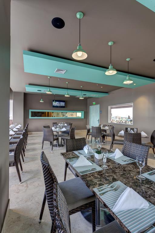 Ghl Hotel Monteria Bagian luar foto Restaurant
